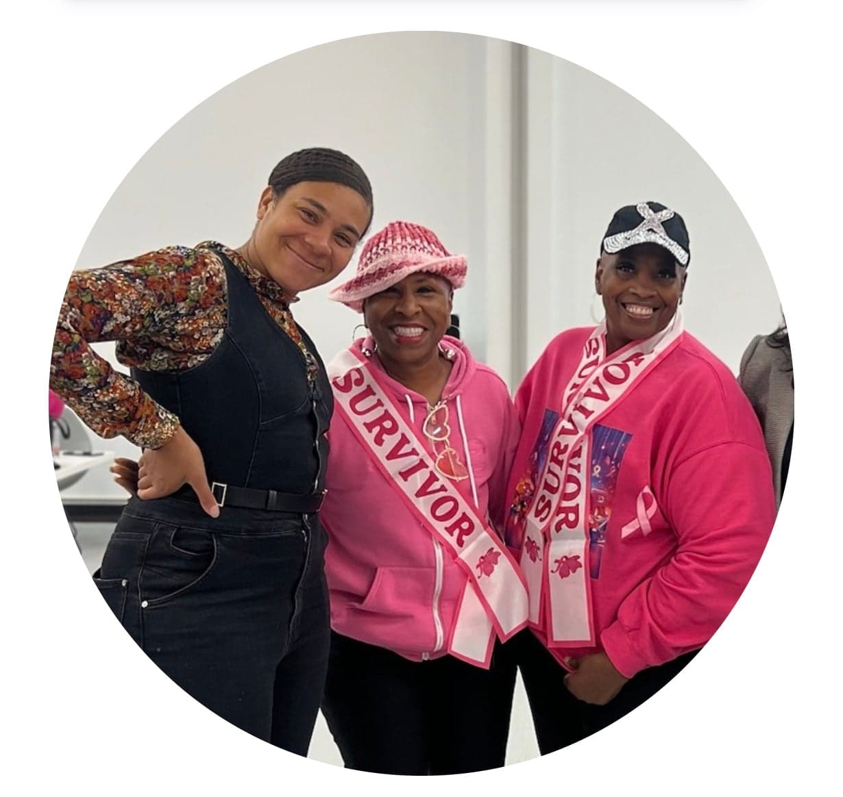 Smiling woman giving a piggyback ride to a laughing young girl.